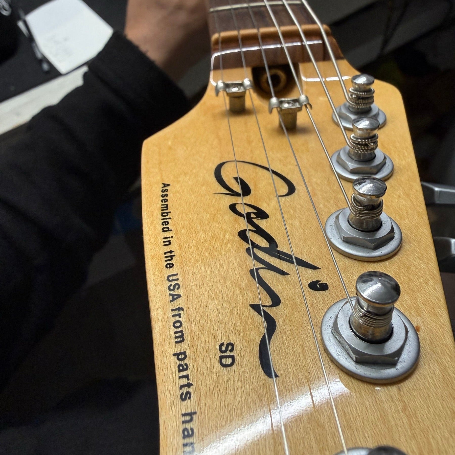 Godin electric guitar on the repair bench