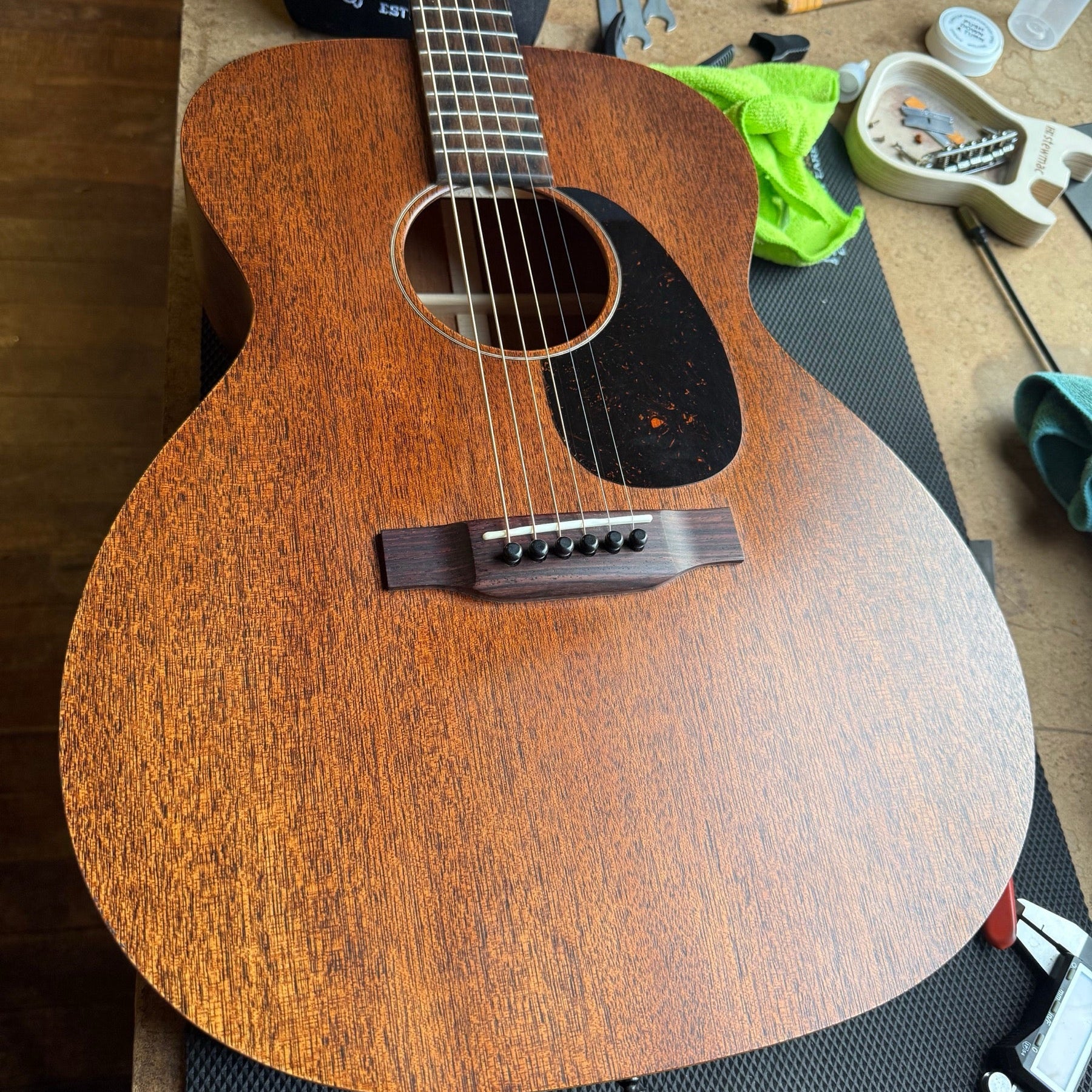 All-mahogany Martin 000-15 acoustic on the repair bench