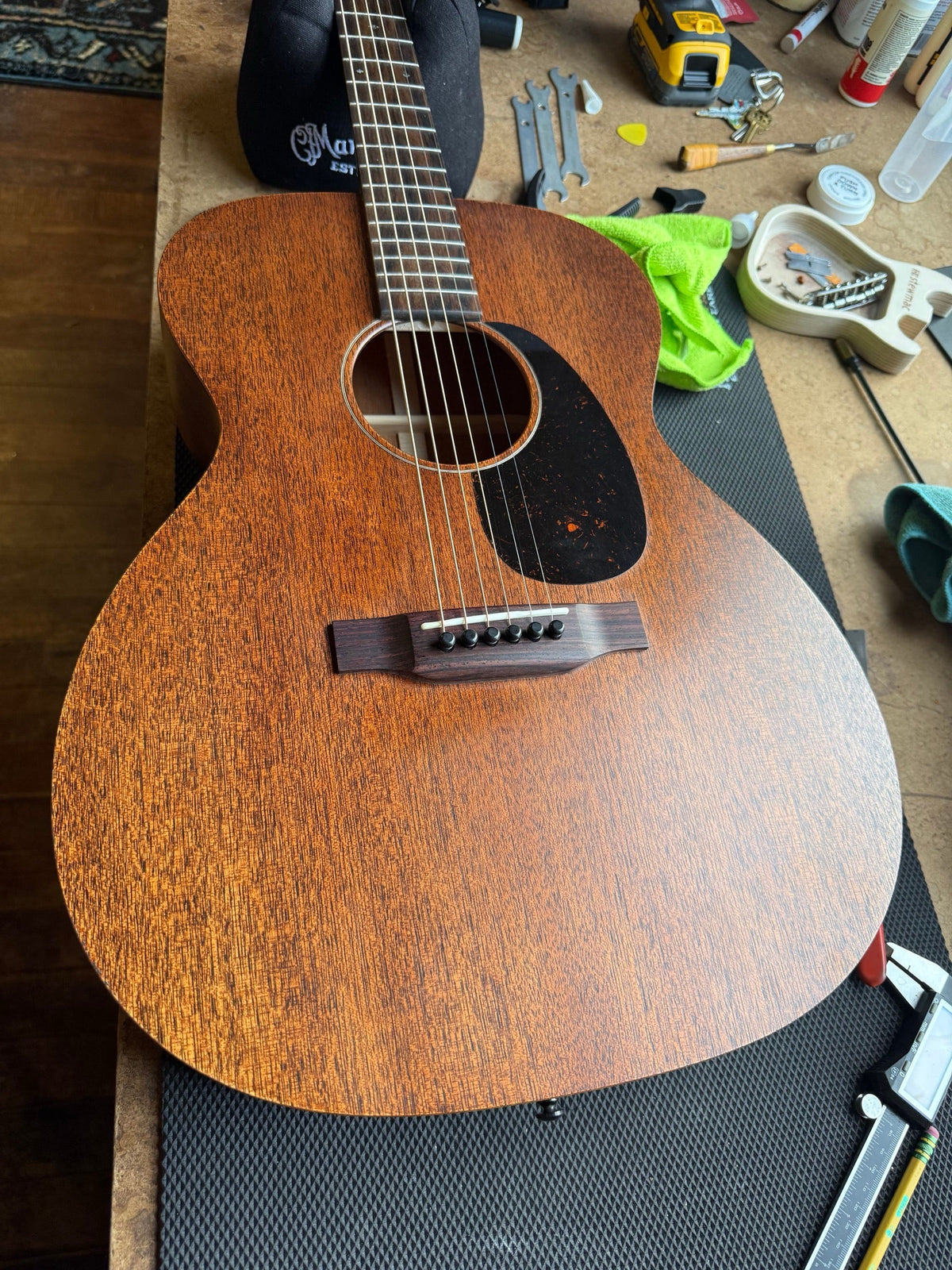 All-mahogany Martin 000-15 acoustic on the repair bench