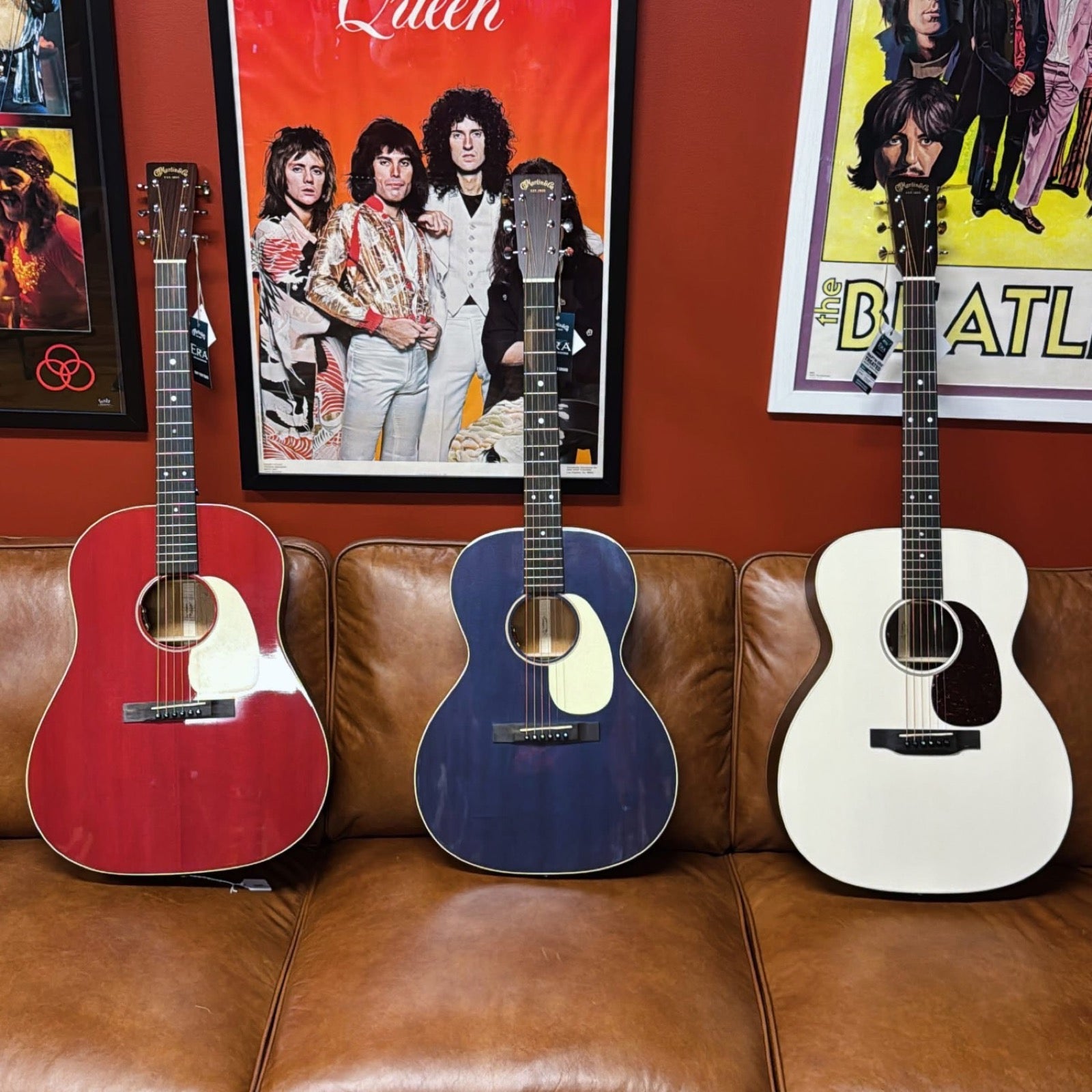 Three Martin 16 Series guitars at Paul's Guitar Hideout in Glens Falls: DSS-16E in Cherry Cola, 00L-16E in Blue Denim and J-16E in Cream
