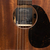 Martin 0-10E Retro Jason Isbell body at three-quarter angle with faux tortoise pickguard
