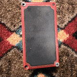 1975-1984 MXR MX-102 Block Logo Dyna Comp, red: bottom plate with two screws in place and two empty screw holes