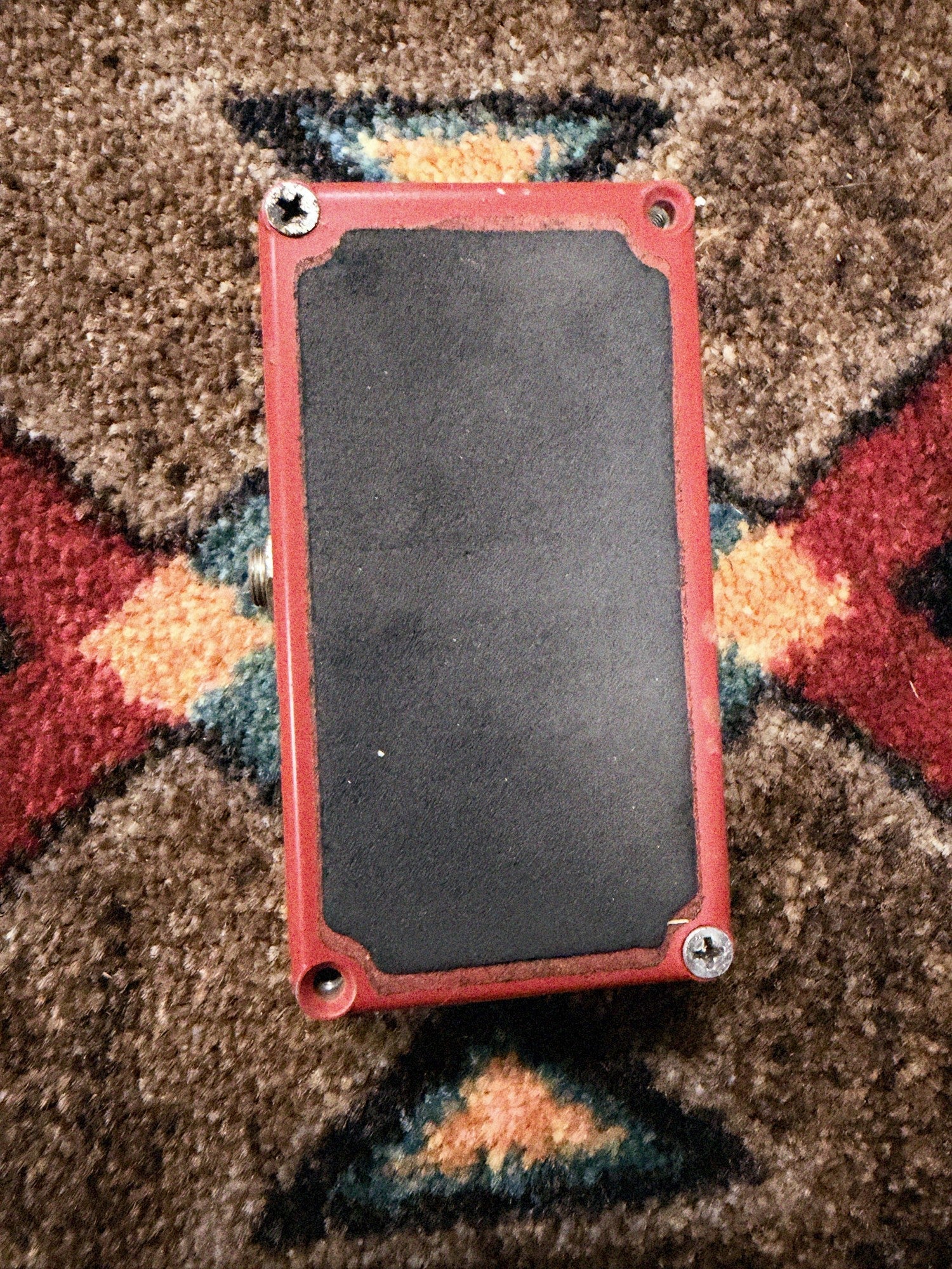 1975-1984 MXR MX-102 Block Logo Dyna Comp, red: bottom plate with two screws in place and two empty screw holes