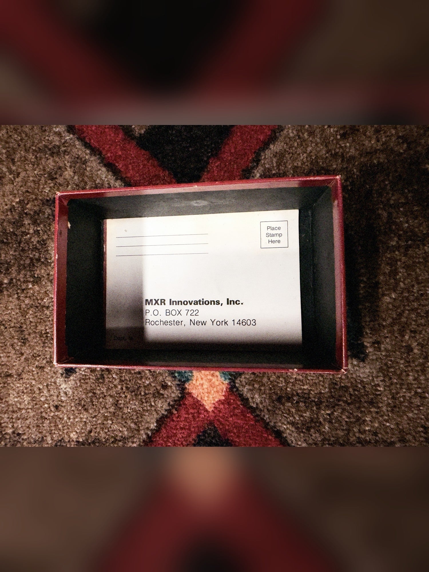 1975-1984 MXR MX-102 Block Logo Dyna Comp, red: open box with the mail-in card addressed to MXR Innovations, Inc. in Rochester, New York