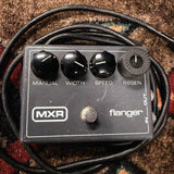1976-1984 MXR MX-117 Flanger, gray: top with the Manual, Width, Speed and Regen knobs, a ribbed MXR knob on Regen, the MXR logo and the footswitch