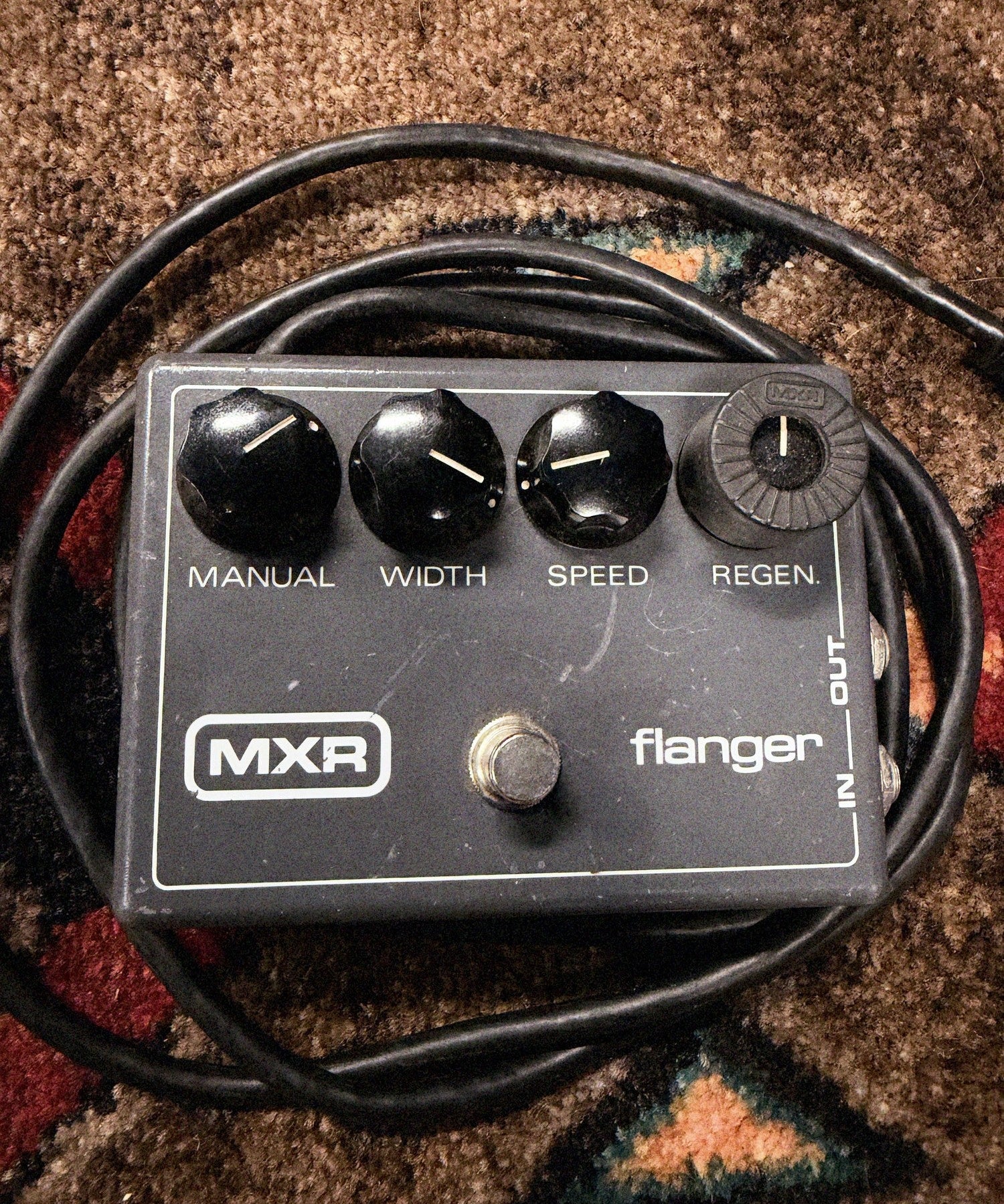 1976-1984 MXR MX-117 Flanger, gray: top with the Manual, Width, Speed and Regen knobs, a ribbed MXR knob on Regen, the MXR logo and the footswitch