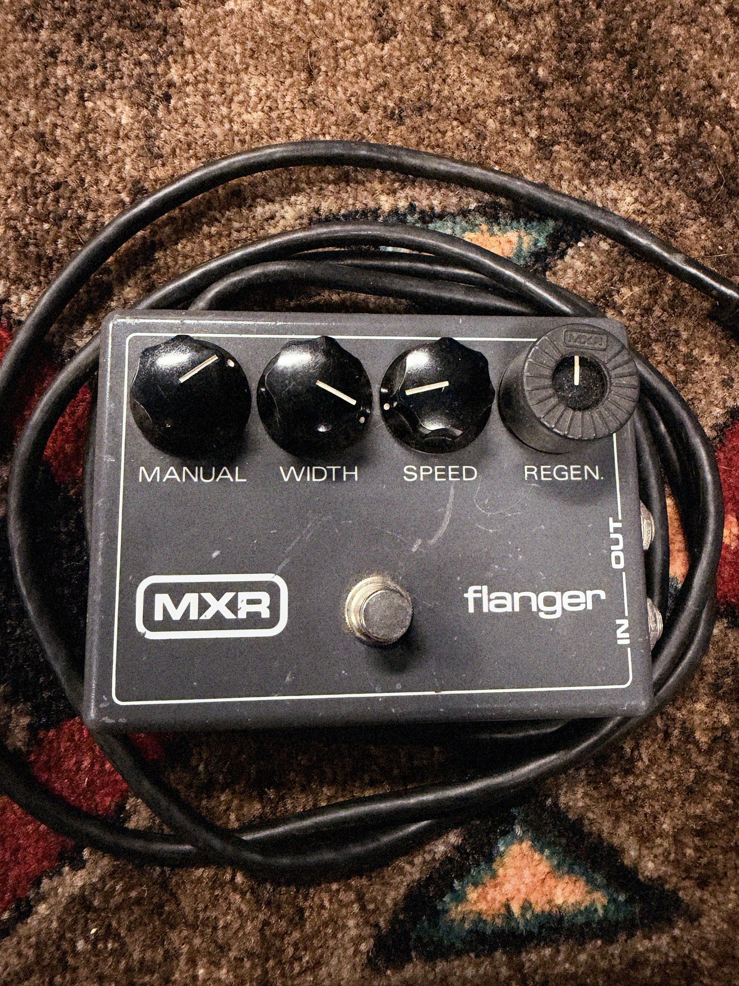 1976-1984 MXR MX-117 Flanger, gray: top with the Manual, Width, Speed and Regen knobs, a ribbed MXR knob on Regen, the MXR logo and the footswitch