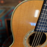 Martin 000C-28SMH Merle Haggard Blue Yodel No. 13, 2001: upper bout, herringbone purfling and abalone rosette