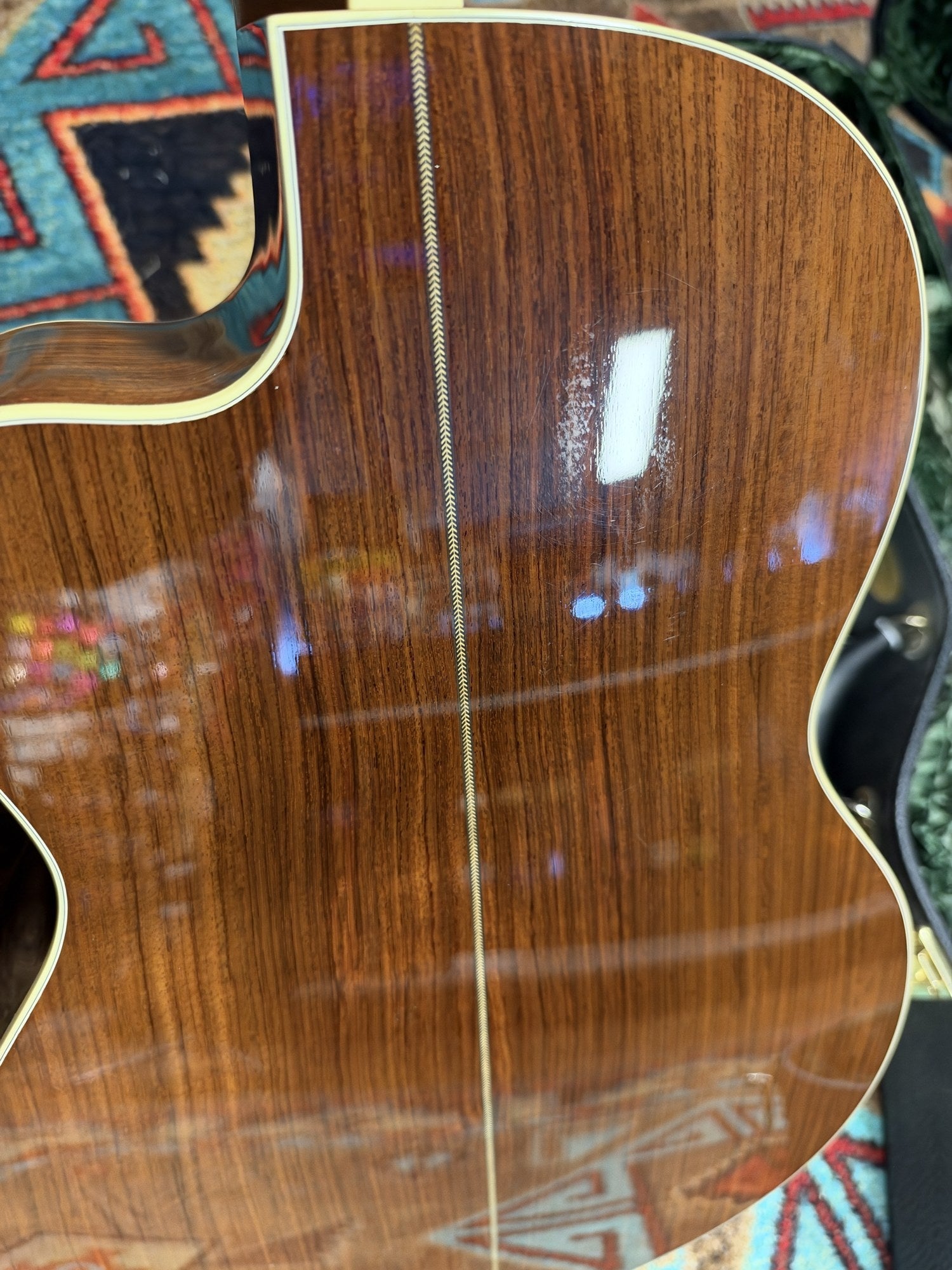 Martin 000C-28SMH Merle Haggard Blue Yodel No. 13, 2001: upper back and cutaway, rosewood grain