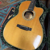 Martin 000C-28SMH Merle Haggard Blue Yodel No. 13, 2001: front of the Sitka spruce top in its hardshell case