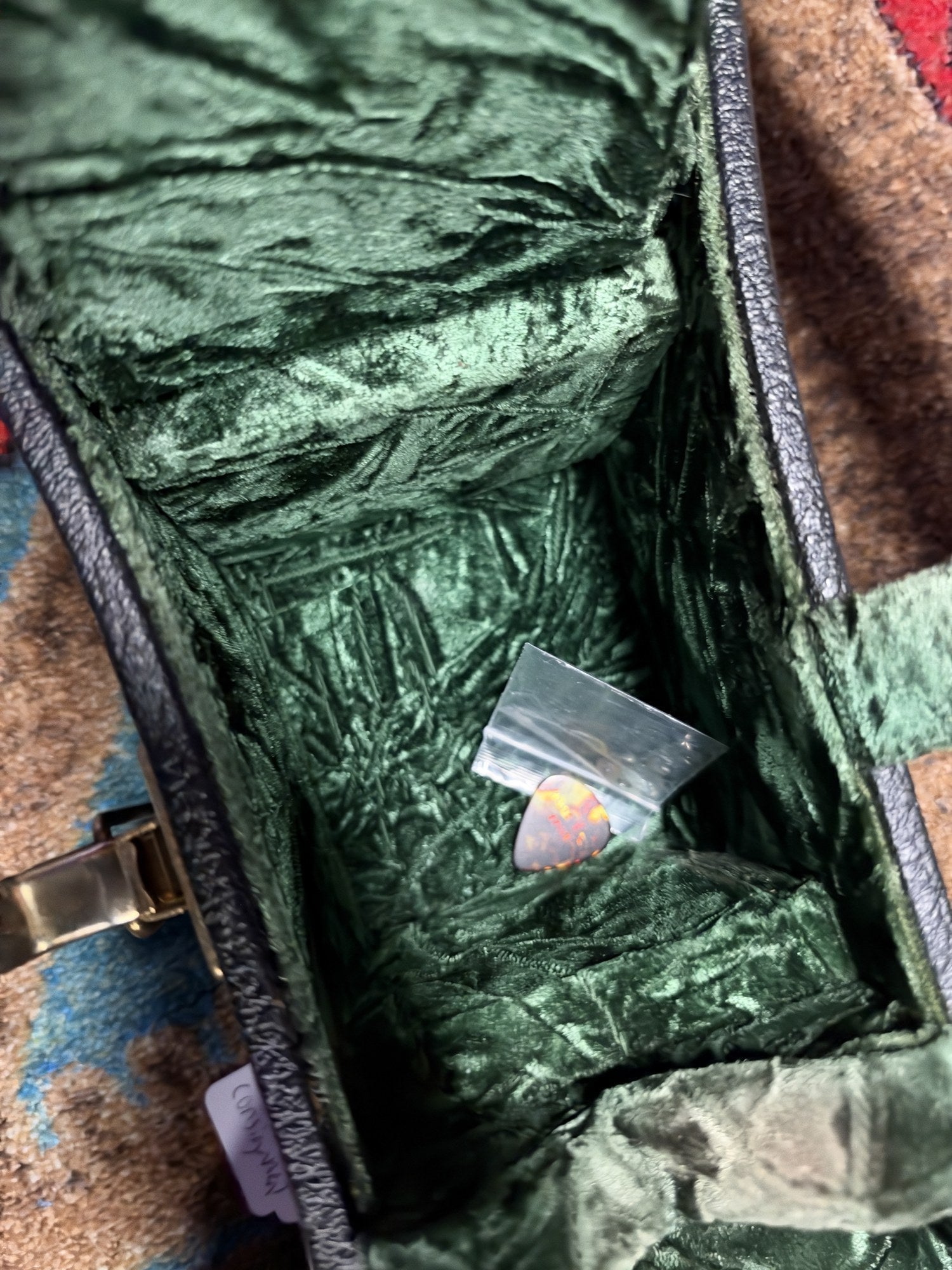 Martin 000C-28SMH Merle Haggard Blue Yodel No. 13, 2001: case accessory compartment with a pick in a bag