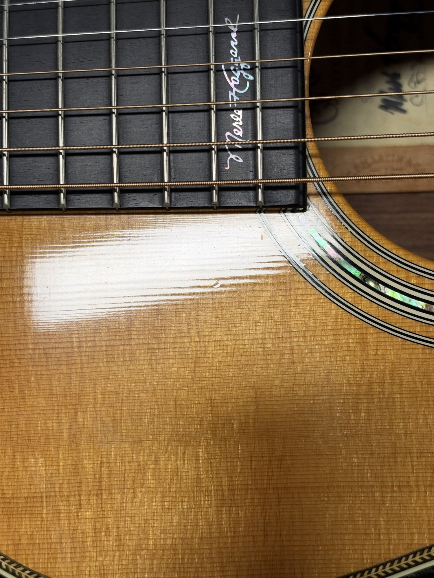 Martin 000C-28SMH Merle Haggard Blue Yodel No. 13, 2001: Merle Haggard signature inlay at the 20th fret, close up