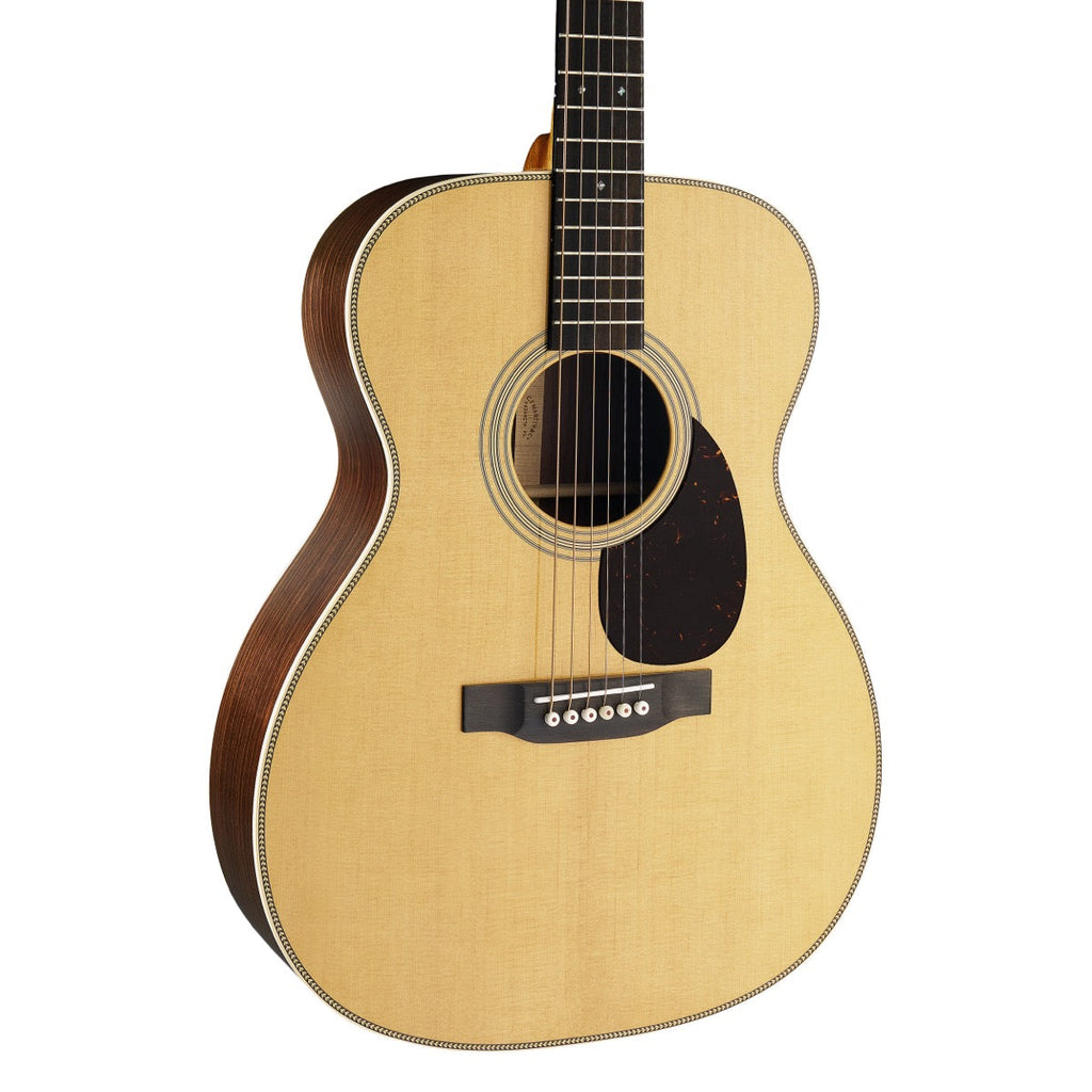 Martin OM-28 Standard Series acoustic guitar, three-quarter angle