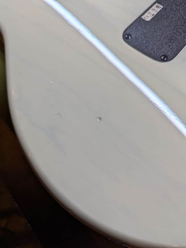2007 Taylor SB1-X Solidbody Classic - back body ding close-up - Pauls Guitar Hideout