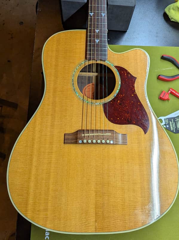 1999 Gibson Songbird Deluxe - body front soundhole and pickguard - Pauls Guitar Hideout