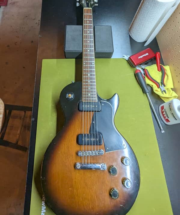 1977-1979 Gibson Les Paul Special 55 Reissue - front full body on workbench - Pauls Guitar Hideout