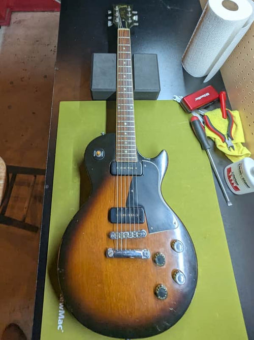 1977-1979 Gibson Les Paul Special 55 Reissue - front full body on workbench - Pauls Guitar Hideout