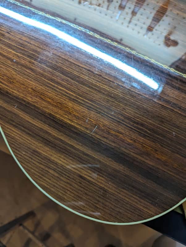 1999 Gibson Songbird Deluxe - rosewood back lower bout close-up - Pauls Guitar Hideout