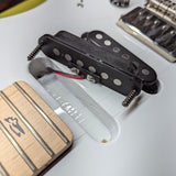 PRS Fiore Mark Lettieri Signature in Sugar Moon — single-coil pickups removed, control cavity exposed, neck heel and Fiore signature trem cover visible — Paul's Guitar Hideout, Glens Falls NY