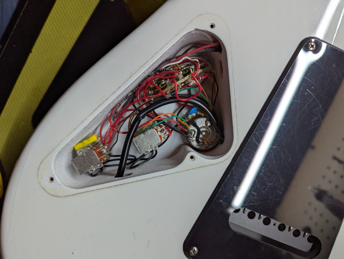 PRS Fiore Mark Lettieri — control cavity wiring detail with push/pull pots, capacitor, and 5-way blade switch — Paul's Guitar Hideout, Glens Falls NY
