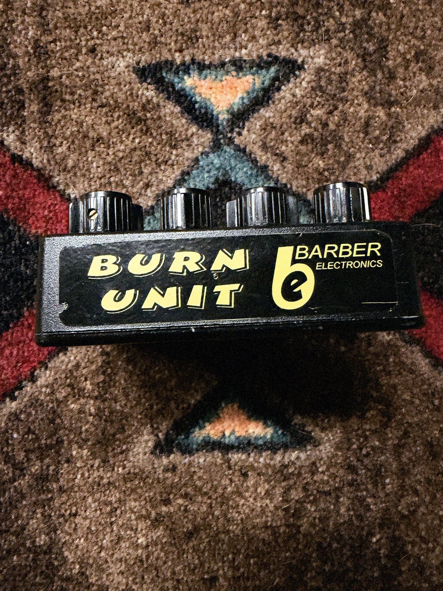 Barber Electronics Burn Unit, black: knob end with the yellow Burn Unit and Barber Electronics decal
