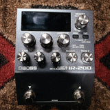 Boss IR-200 Amp & IR Cabinet, dark gray: top with the display, the Memory, Amp, Cabinet and Ambience knobs, the Gain, Level, Bass, Middle and Treble knobs and both footswitches