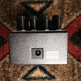 Boss RV-6 Reverb, dark gray: back end with the power jack and the Boss PSA adapter sticker