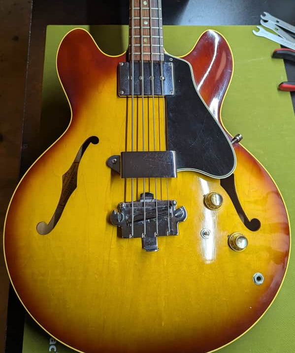 1967 Gibson EB-2 - body front with f-holes and pickup - Pauls Guitar Hideout