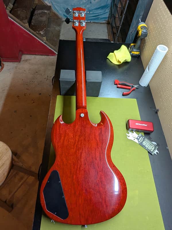 2019 Gibson SG Standard Bass - back full body on workbench - Pauls Guitar Hideout