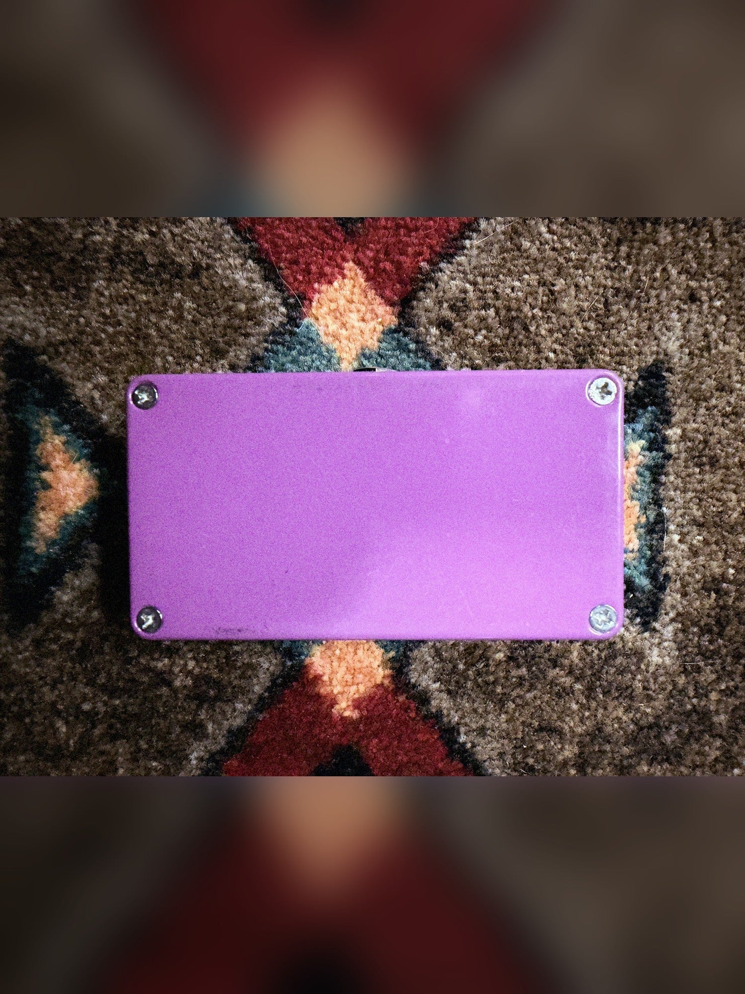 Catalinbread Karma Suture Germanium, purple: bottom plate with four screws and a small scuff near one edge