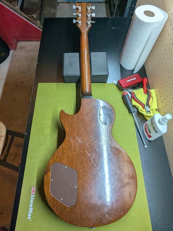 1977-1979 Gibson Les Paul Special 55 Reissue - back full body on workbench - Pauls Guitar Hideout