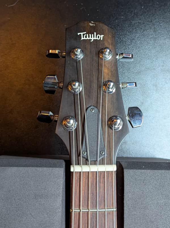 2007 Taylor SB1-X Solidbody Classic - headstock front with Taylor logo - Pauls Guitar Hideout