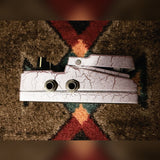 DigiTech Grunge, white crackle: side with the two output jacks and one of the footswitch release pins