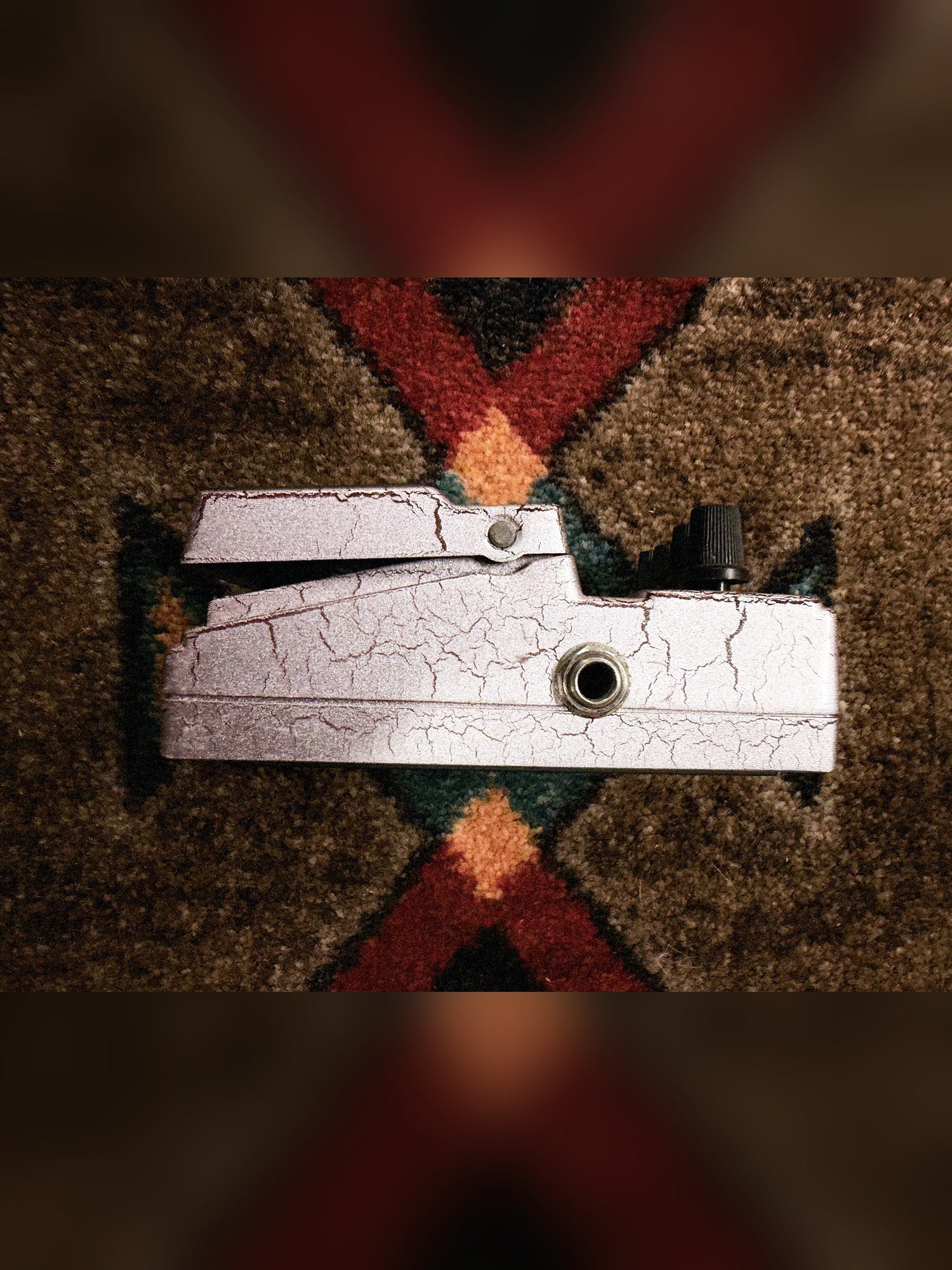 DigiTech Grunge, white crackle: side with the input jack and the other footswitch release pin