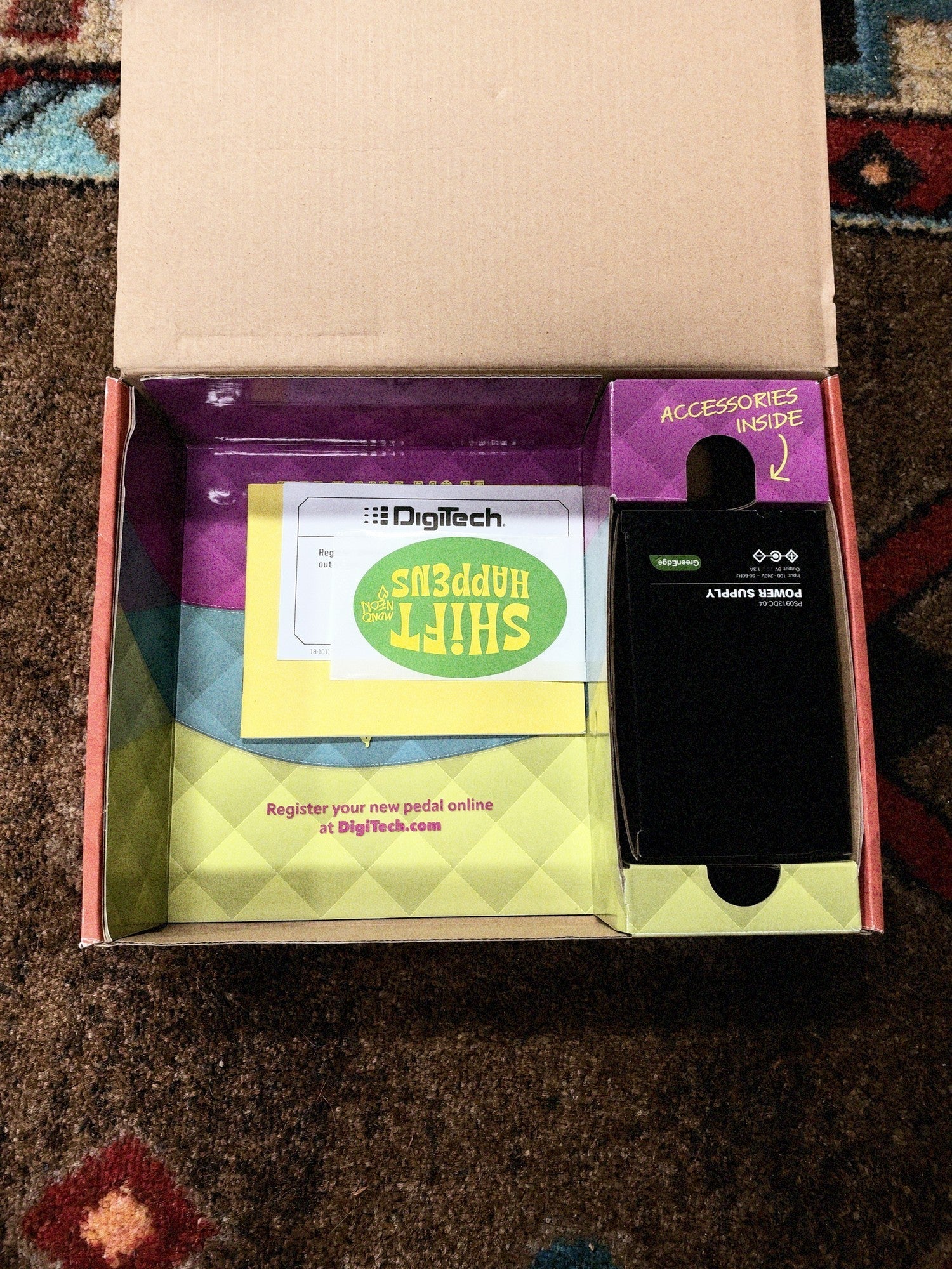 DigiTech MonoNeon Signature Whammy, neon orange and yellow: open box with the power supply box, the Shift Happens sticker and the paperwork