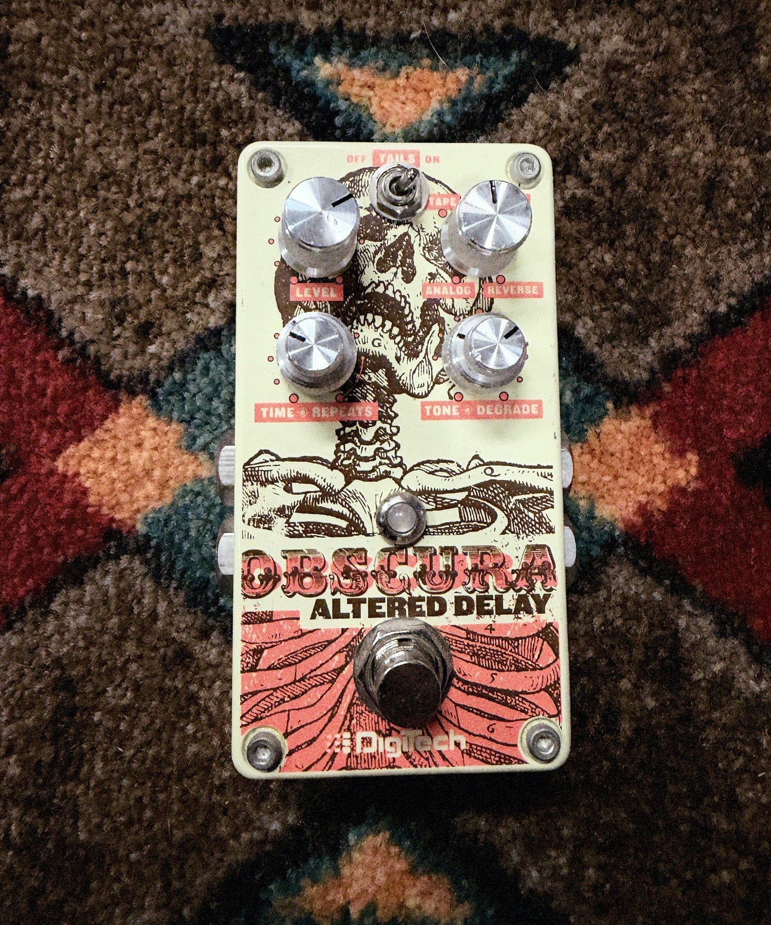 DigiTech Obscura Altered Delay, cream: top with the Level, delay type, Time and Repeats, and Tone and Degrade knobs, the Tails switch and the footswitch