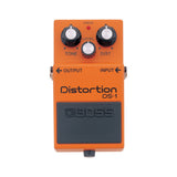 Boss DS-1 Distortion pedal, black enclosure with TONE, LEVEL, and DIST knobs.