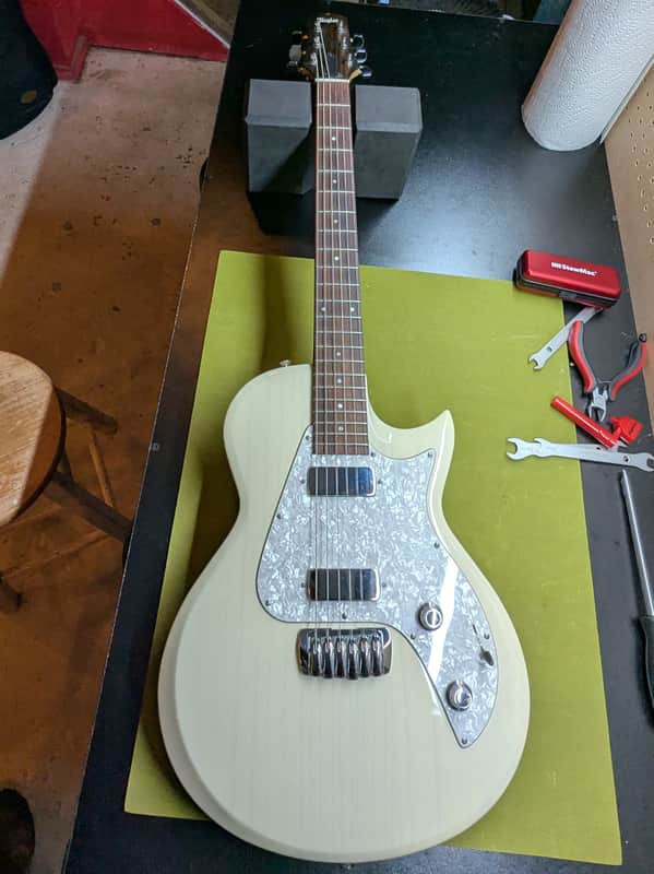 2007 Taylor SB1-X Solidbody Classic - front full body trans white - Pauls Guitar Hideout