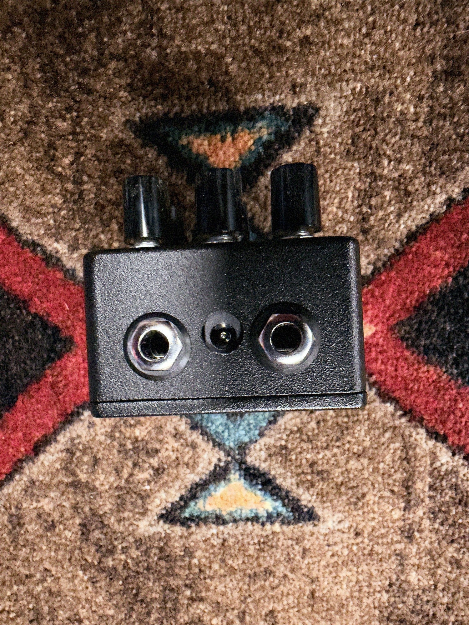 EarthQuaker Devices Afterneath V3, black: knob end with two 1/4 inch jacks and the power jack between them