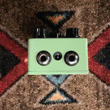 EarthQuaker Devices Plumes, green: knob end with two 1/4 inch jacks and the power jack between them