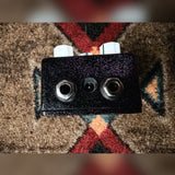 EarthQuaker Devices Plumes, purple sparkle: top end with the two jacks and the power jack between them