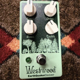 EarthQuaker Devices Westwood, seafoam green: top with the Level, Drive, Bass and Treble knobs, the forest artwork, the green LED and the footswitch