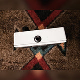 Electro-Harmonix Big Muff Pi with Tone Wicker, white: left side with the amp output jack