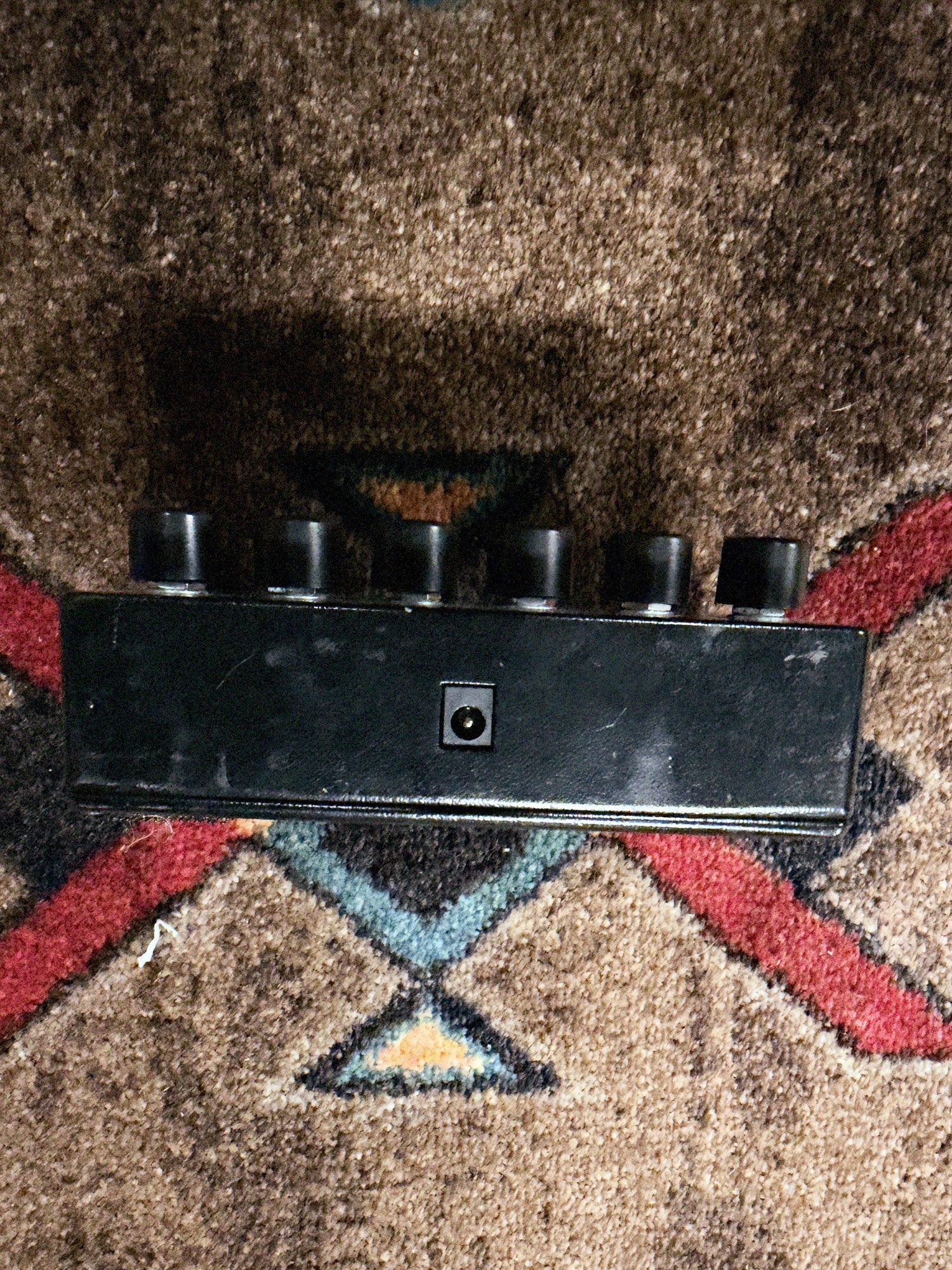 Electro-Harmonix Metal Muff with Top Boost, black: knob end with the 9-volt power jack