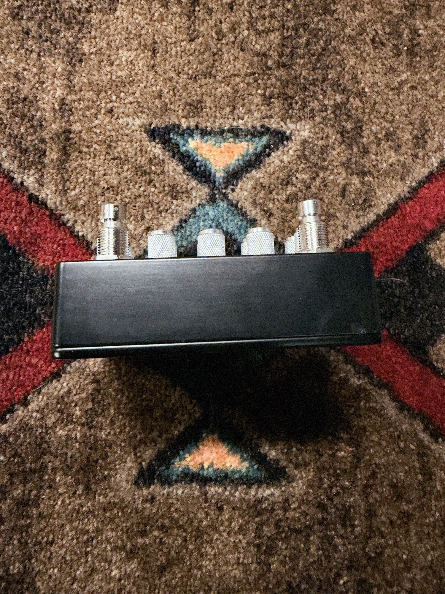 Empress Effects Heavy, black: front side of the enclosure below the two footswitches