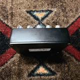 Empress Effects Heavy, black: back side of the enclosure below the knob row, with part of the bottom plate