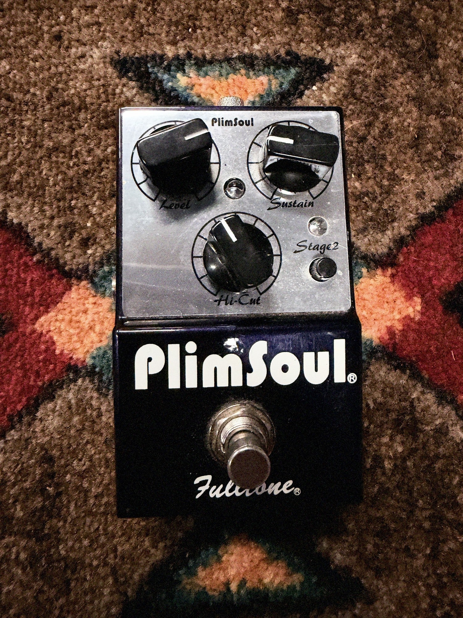 Fulltone PlimSoul, dark blue and silver: top with the Level, Sustain, Hi-Cut and Stage 2 knobs, two LEDs, the footswitch and a small paint chip above the logo