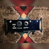 Fulltone PlimSoul, dark blue and silver: left side with the output jack and the 9VDC to 18VDC power jack