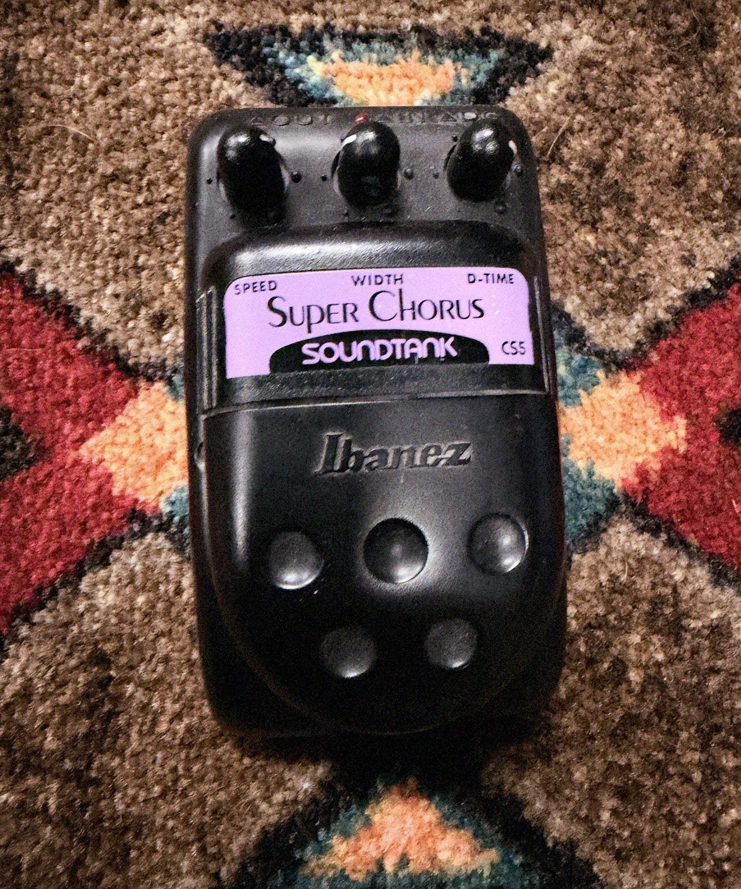 Ibanez Soundtank CS5 Super Chorus, black: top with the Speed, Width and D-Time knobs, the red LED, the purple Super Chorus label and the Ibanez pedal