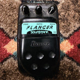Ibanez Soundtank FL5 Flanger, black: top with the Speed, Depth and Regen knobs, the red LED, the teal Flanger label and the Ibanez pedal